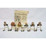 A collection of six Wishbone figures by Robert Whiting, each figure made of a wishbone and clay,