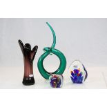 Two art glass paperweights with fish decoration a blown glass vase and a glass sculpture