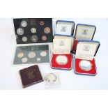 Four cased 1977 Royal Mint Silver proof Crown coins with COA's a Troy Ounce Silver Indian head coin,
