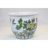 Chinese jardiniere/flower pot with floral and bird decoration, signed to base