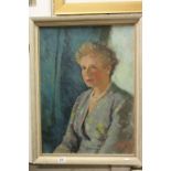 Pettet mid 20th Century oil on board portrait of a seated lady signed Dublin label verso