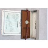 Vintage boxed Ladies Hallmarked 9ct Gold wristwatch in a "Baume" watch box with papers