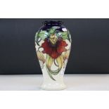 Large Moorcroft Pottery urn type Vase in "Anna Lily" pattern and dated '98 to base, stands approx