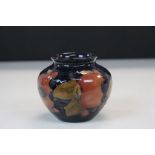 Small Moorcroft Pottery Bowl in "Pomegranate" pattern, stands approx 7cm