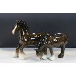 Two Beswick ceramic horses to include no.975 Cantering Shire in "Brown" gloss colour, standing