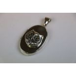 Silver photo locket with owl decoration