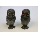 Two Pewter novelty Owl Pepperettes, both approx 7.5cm tall with different colour eyes &