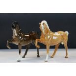 Two Beswick ceramic First Version Horse's No.1549 in "Brown" and "Palomino" colour, standing