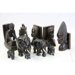 Box containing carved hardwood African figures to include elephants, figures, bookend etc