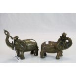 Pair of bronze elephants with four character marks to base