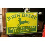 Vintage Enamel advertising Sign in green & yellow and marked "John Deere Quality Farm Equipment",