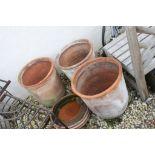 Three large terracotta plant pots with stands (6)