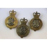 A Collection Of Three Brass The 7th Queens Own Hussars Cap Badges With Rear Sliders.