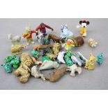 Collection of miniature figures including Wade Whimsies, Disney, Rupert bear etc