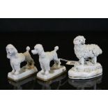 19th Century Staffordshire sheep figure and a pair of 20th Century poodle figures