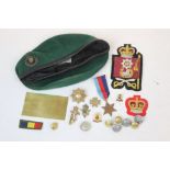 A Mixed Lot Of Military Collectables To Include A Notts & Derby Sherwood Foresters Cap Badge, A