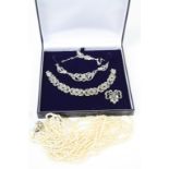 Marcasite trio of jewellery to include; necklace, bracelet & brooch plus a multi strand natural