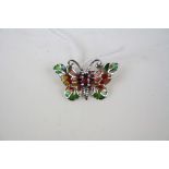 A silver and plique a jour butterfly brooch