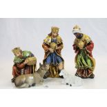 Nativity set, three wise men bearing gifts, donkey and sheep