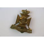A Wiltshire Regiment All Brass Cap Badge With Rear Slider.