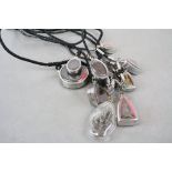 12 Thai amulets on necklaces