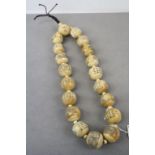 Chinese large bone bead necklace with figures and characters