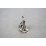 Silver seated rearing elephant figure
