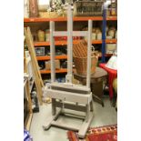 Victorian Oak H-Frame Artist's Easel, later painted, fully adjustable with winding handle