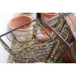 Pair of cast iron wall hanging hay racks (2)