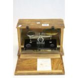 Vintage Wooden cased set of Balance scales to include a variety of Weights
