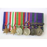 A British World War Two Miniature Medal Group To Include The British War Medal, The Defence Medal,