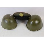 Two Vintage Russian Military Helmets Complete With Liners Together With An Officers Cap.