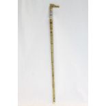 Bamboo walking stick with bone carved mount and a horse head handle