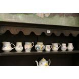 Small quantity of vintage Poole Pottery, various hand painted designs to include Fuschia pattern