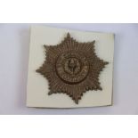 A Vintage World War Two / WW2 Cheshire Regiment Plastic Economy Cap Badge With Two Prong Metal