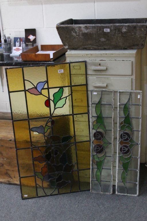 Three Leaded Stained Glass Panels with Floral Motifs, one x 105cms x 59cms and two x 84cms x 18cms