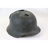 A World War Two / WW2 German Helmet In Relic Condition.