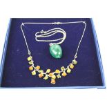 Boxed Hallmarked Silver & Amber necklace in organic form plus a Hallmarked Silver Malachite egg