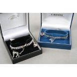 Two boxed Hallmarked Silver Charm bracelets