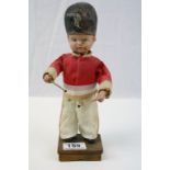 Clockwork Drummer Boy, marked "Foreign" to wooden base, stands approx 25cm, lacking Drum