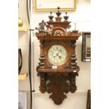 Large ornate wooden cased Key wind striking Wall Clock, measures approx 92 x 36 x 17.5cm at the