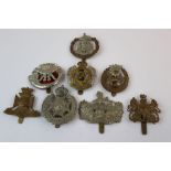 A Collection Of Eight British Army Cap Badges To Include The Gloucestershire Regiment, The Royal