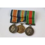 A British World War One & World War Two Miniature Medal Group To Include The British War Medal,