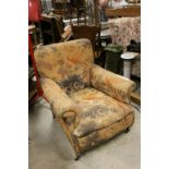 Late 19th / Early 20th century Upholstered Armchair raised on Square Tapering Legs and Castors