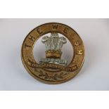 A Welsh Regiment Brass And White Metal Helmet Plate Centre Badge With Four Loop Attachments To The