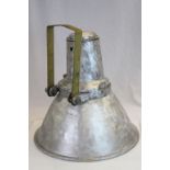 Large industrial polished metal lamp with adjustable bracket