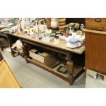 Oak Refectory Table of 17th century Design, the plain planked rectangular top with a carved