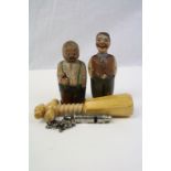 Metropolitan Whistle with chain, two carved Wooden figures one with internal Corkscrew, the other