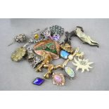 Collection of brooches including Victorian silver, Arts & Crafts etc