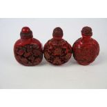 Three cinnabar lacquer snuff bottles